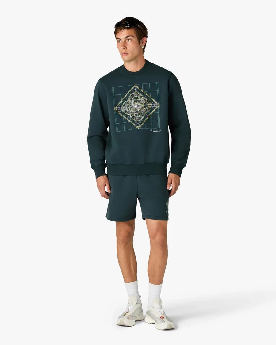 Dark Teal Logo Geometrie Sacree Embroidered Sweatshirt — on model