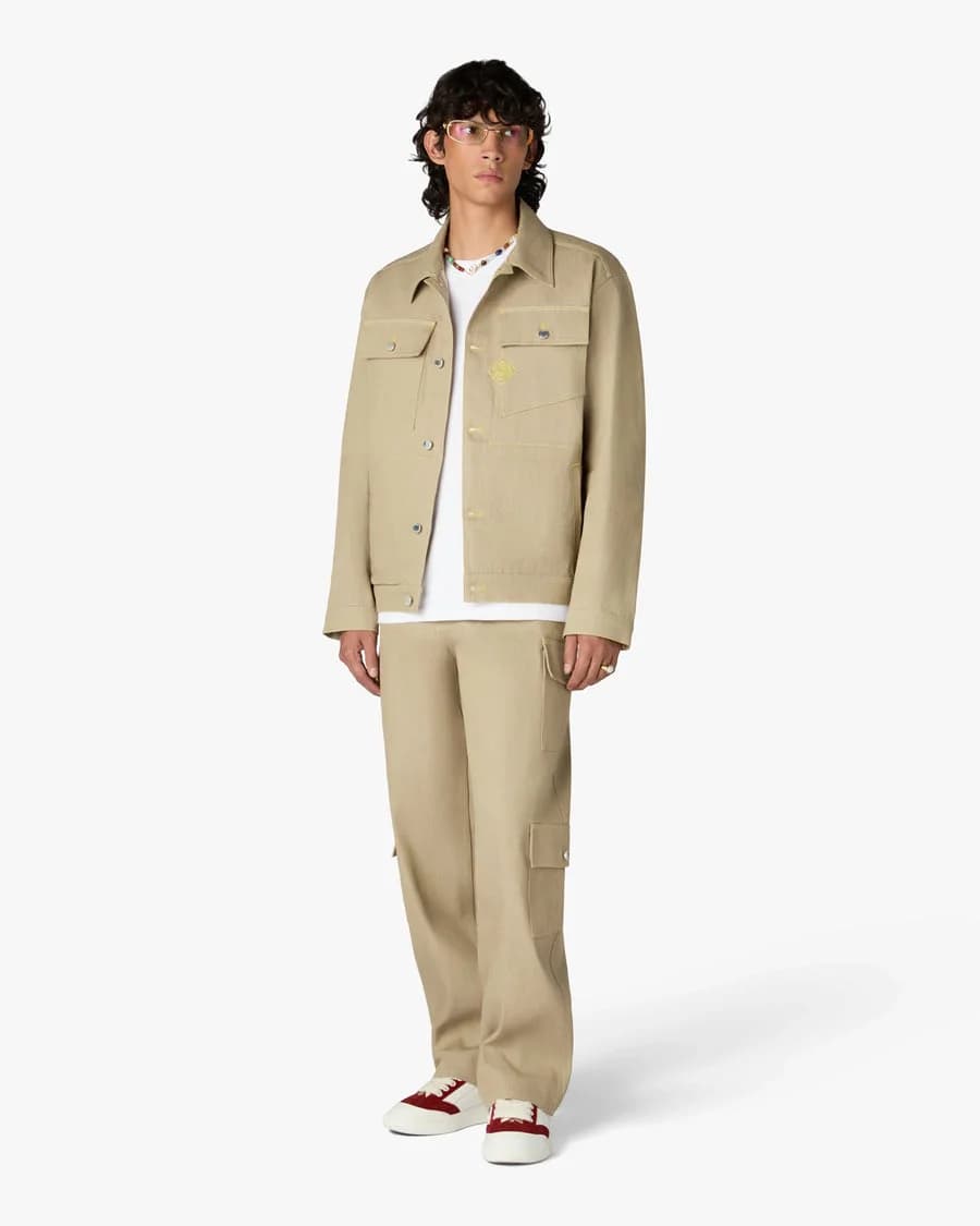 Beige Desert Canvas Denim Jeans — on model