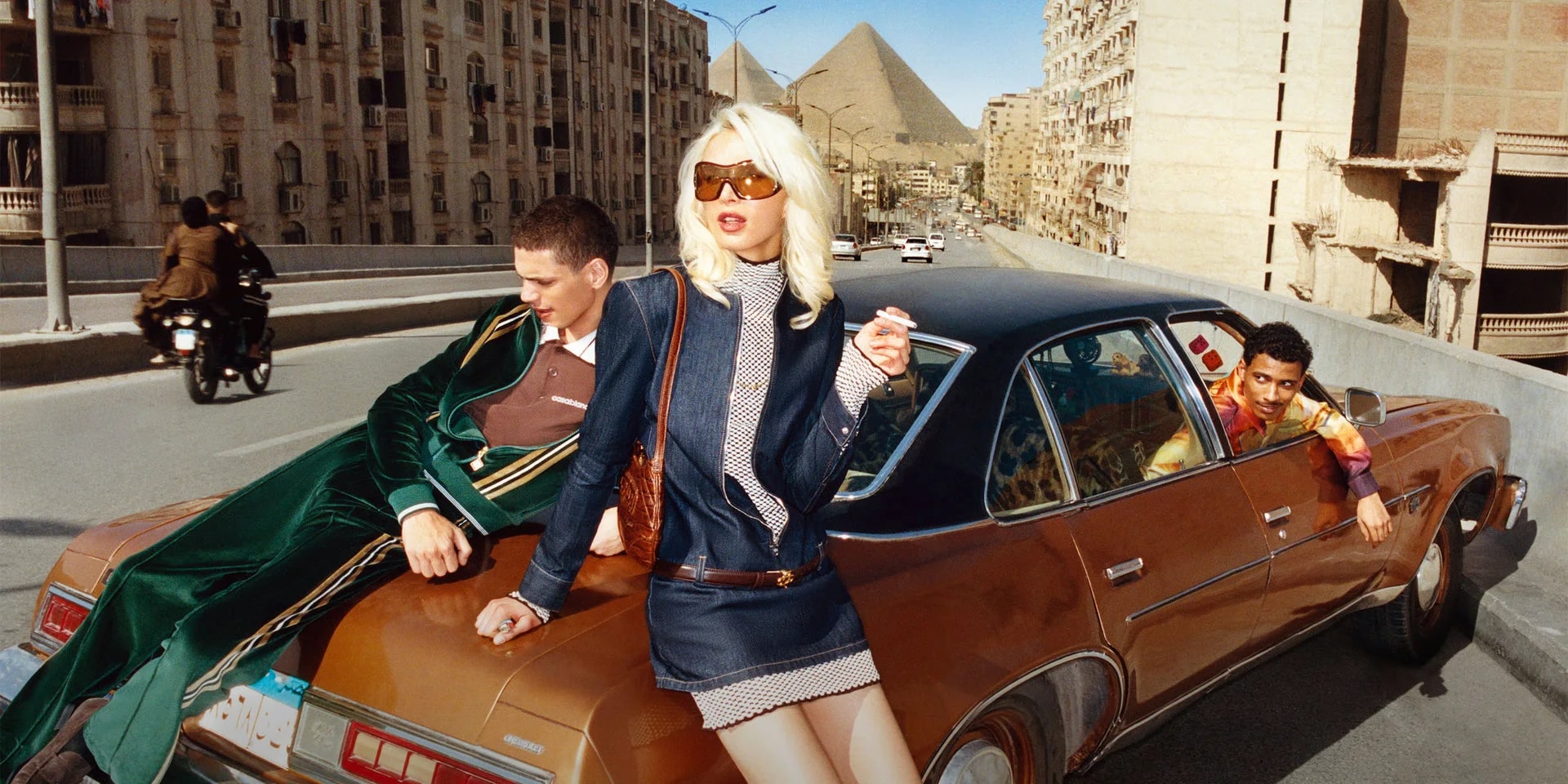 Casablanca campaign: three models in silk, denim and a green tracksuit, photographed in Cairo